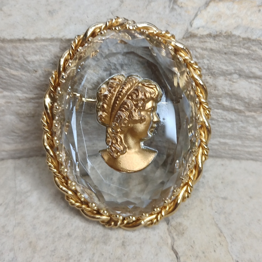 Vintage crystal cameo reversed carved brooch